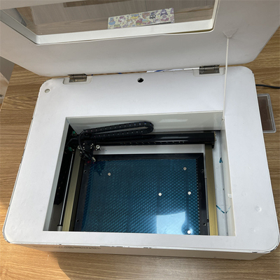 Yüksek Kesme Doğruluğu ve 25 * 36 CM Kesme Alanı Ekran Koruyucu için Lazer Kesme Sistemi